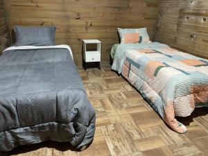 Ένα ή περισσότερα κρεβάτια σε δωμάτιο στο Villa Gardenia