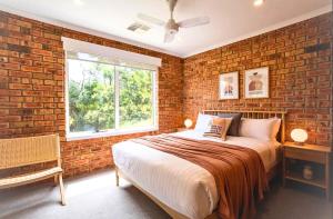 Ένα ή περισσότερα κρεβάτια σε δωμάτιο στο Hillside Hideaway Sleeps 10 Stunning Views +42 φωτογραφίες