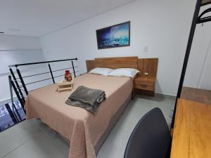 Ένα ή περισσότερα κρεβάτια σε δωμάτιο στο Lofts Indaiatuba +96 φωτογραφίες