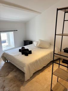 Ένα ή περισσότερα κρεβάτια σε δωμάτιο στο Duplex cosy 2 chambres