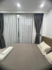 Postel nebo postele na pokoji v ubytování VM Apartment võng thị,The Lakeview - West Lake