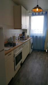 Kuchyň nebo kuchyňský kout v ubytování Plön - Traumhafter Seeblick