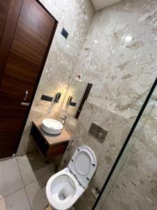 Ένα μπάνιο στο Hotel bliss inn & terrace