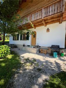 a porch of a house with a wooden balcony at Ferienwohnung Mariana in Bad Ischl