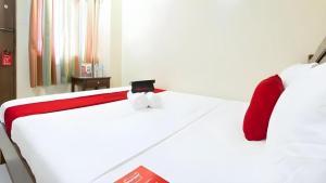 Postel nebo postele na pokoji v ubytování Dino Residences