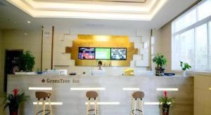 TV a/nebo společenská místnost v ubytování GreenTree Inn Zhangjiagang Yangshe Old Street Stadium