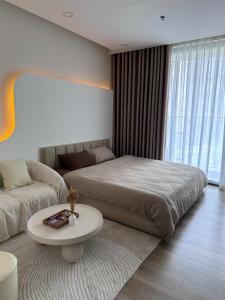 Ένα ή περισσότερα κρεβάτια σε δωμάτιο στο Louis Homestay