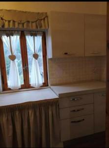 Η κουζίνα ή μικρή κουζίνα στο Casa Latini baita alta montagna +7 φωτογραφίες