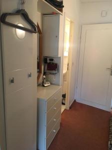 Kuchyň nebo kuchyňský kout v ubytování Parkwohnanlage Atlantic App. 228, Fam. Schläfke