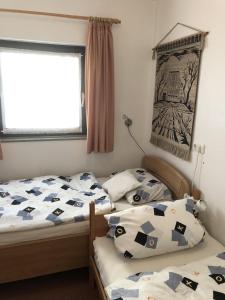 Postel nebo postele na pokoji v ubytování Parkwohnanlage Atlantic App. 228, Fam. Schläfke