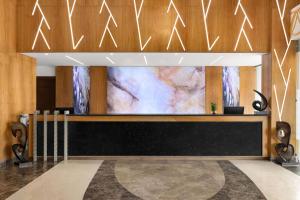 TV a/nebo společenská místnost v ubytování Ramada Plaza by Wyndham Jammu Vijaypur