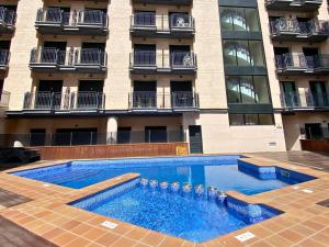 Kolam renang di atau dekat dengan Nagomi Suite - Modern Apartment with Parking & Swimming Pool
