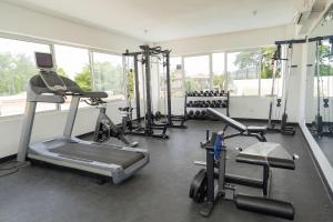 a gym with several exercise bikes and a laptop at SoliMar Caribeño in Boca Chica