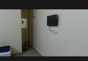 TV a/nebo společenská místnost v ubytování Hotel sai gaurav ac,non ac room