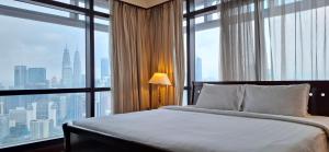 Katil atau katil-katil dalam bilik di Times Square Suite Residence Kuala Lumpur +83 gambar