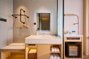 Φωτογραφία από το άλμπουμ του Suoxing Hotel Wulanbutong Scenic Area Branch σε Xiaogushan