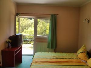 Postel nebo postele na pokoji v ubytování Balla Appartements