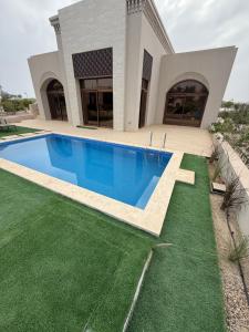 Bazén v ubytování Ocean Star nebo v jeho okolí