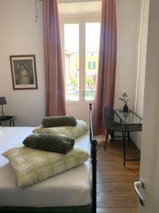 Voodi või voodid majutusasutuse Albergo Gargnano toas