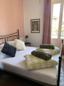 Voodi või voodid majutusasutuse Albergo Gargnano toas
