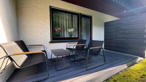 Posezení v ubytování Haus Schanzenblick Gästezimmer 7 mit Bad und Terrasse