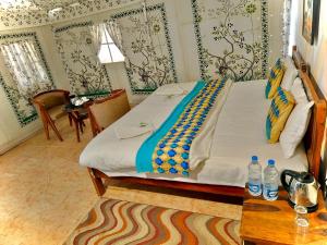 Ένα ή περισσότερα κρεβάτια σε δωμάτιο στο Melody Moon Desert Camp & Resort