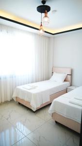 Katil atau katil-katil dalam bilik di Villa Hisar B3 +18 gambar