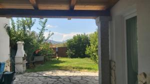 a view of a yard from a patio at Casa Isabel IUN P9639 in Olbia