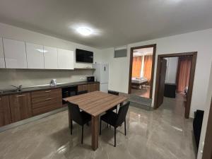 Kuchyň nebo kuchyňský kout v ubytování Jaci Apartaments + 16 fotografií