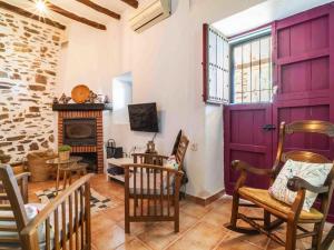 TV a/nebo společenská místnost v ubytování Casa Crisantemo with sea view and pool in Adra