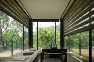 Ένα ή περισσότερα κρεβάτια σε δωμάτιο στο Autumn Whisper Eden Villas