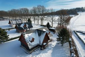 an aerial view of a house covered in snow at Wellness Chalupa Fred in Vrchlabí