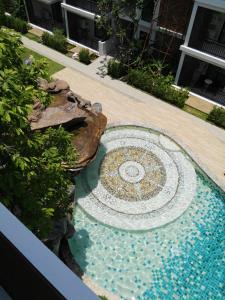 Piscina di The Title Rawai West Wing Pool View Suite o nelle vicinanze
