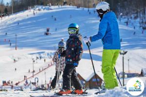 Επισκέπτες που μένουν στο Domki na Szczycie - balia jacuzzi na wyłączność