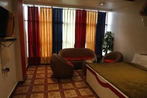 Posezení v ubytování Hotel Om Complex