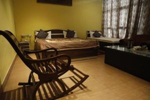 Postel nebo postele na pokoji v ubytování Hotel Om Complex