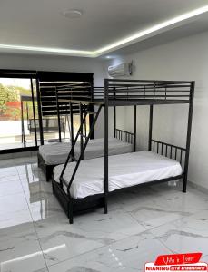 Ένα ή περισσότερα κρεβάτια σε δωμάτιο στο Nianing Villa de Charme avec Piscine