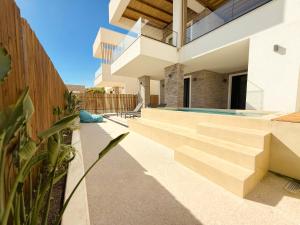 an image of a house with a swimming pool at Villa 4 - Drymades - Thymus Residence in Dhërmi