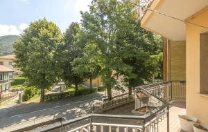an apartment balcony with a view of a street at 2 Bedroom Cozy Apartment In Montoggio in Montoggio