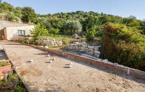 a group of birds walking down a dirt road at 4 Bedroom Cozy Home In Ragusa in Ragusa