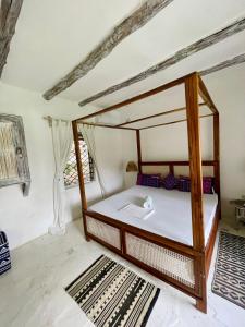 Postel nebo postele na pokoji v ubytování Villa Bavarria + 6 fotografií