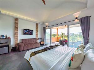 Postel nebo postele na pokoji v ubytování Ha Sip Ha Villa Rooms - by KohChangVillas