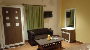 TV a/nebo společenská místnost v ubytování Hotel Om Complex + 27 fotografií