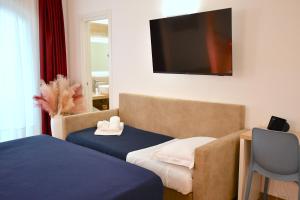 Postel nebo postele na pokoji v ubytování BAJAMAR BEACH HOTEL