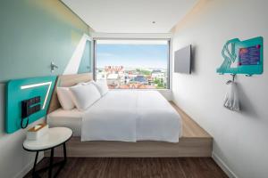Tru by Hilton Viet Tri City Centre客房内的一张或多张床位