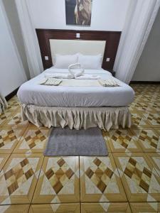 Postel nebo postele na pokoji v ubytování DeepSea Resort Kitale