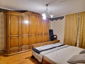 Postel nebo postele na pokoji v ubytování Casa Mioritei