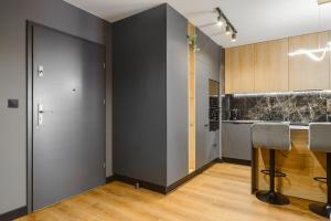 Billede fra billedgalleriet på Lumina luxury apartment with parking i Łódź