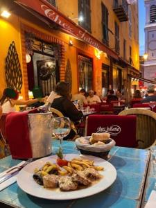 a plate of food on a table at a restaurant at Rossetti in Nice