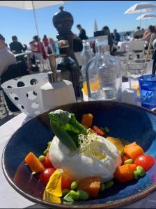 a plate of food with eggs and vegetables on a table at Rossetti in Nice +14 photos